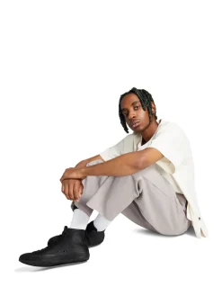 Converse Black Leather High Top Trainers