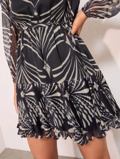 Friends Like These Black Mono Petite Long Sleeve Chiffon Pleated Hem Geo Mini Dress Clearance