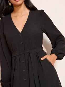 Friends Like These Long Sleeve Tie Waist Button Up Textured Midi Dress Black