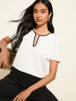 Friends Like These Short Angel Sleeve Tipped Trim Blouse Cream Online