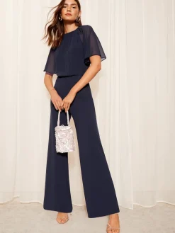 Friends Like These Petite Chiffon Flutter Sleeve Scuba Jumpsuit Navy Blue Discount