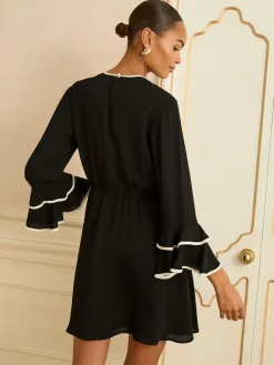 Love & Roses Bow Tipped Flute Sleeve Mini Dress Discount