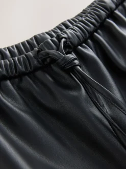 Nothing Ordinary Black Faux Leather Side Stripe Trousers
