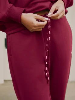 self. Red Cuffed Joggers Online