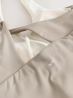 self. Twist Back Crop Top Stone Hot